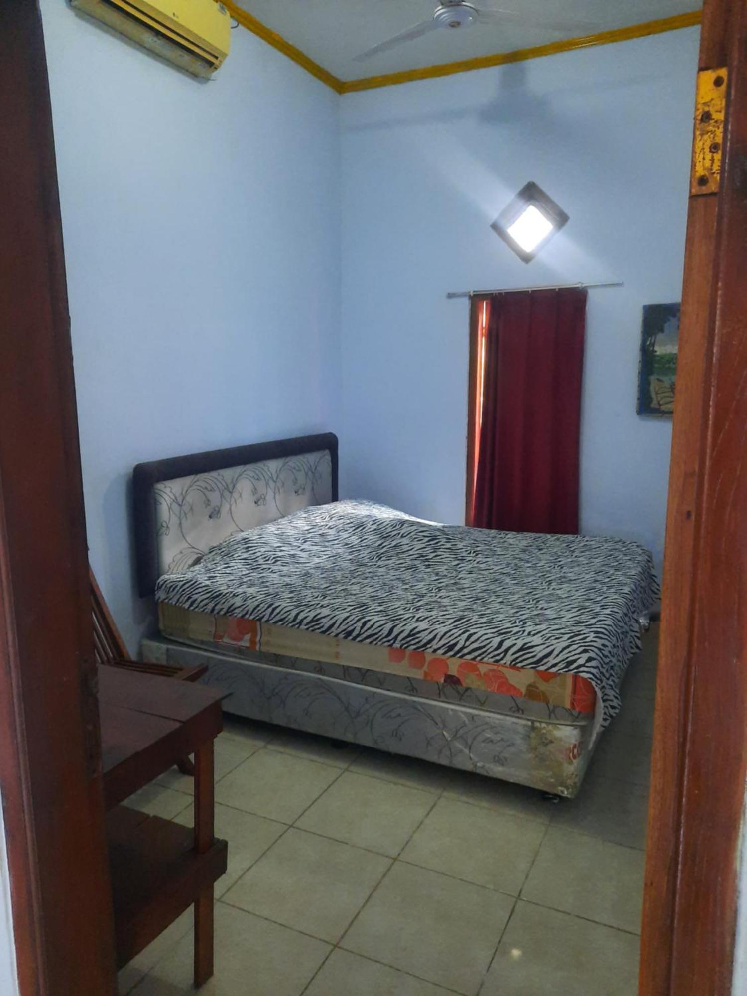 Red Beach Homestay Pasanggaran Номер фото